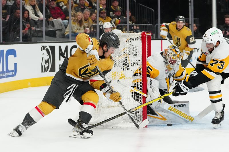 Jan 20, 2024; Las Vegas, Nevada, USA; Vegas Golden Knights center Brendan Brisson (19) shoots against Pittsburgh Penguins goaltender Tristan Jarry (35) during the first period at T-Mobile Arena. Mandatory Credit: Stephen R. Sylvanie-USA TODAY Sports