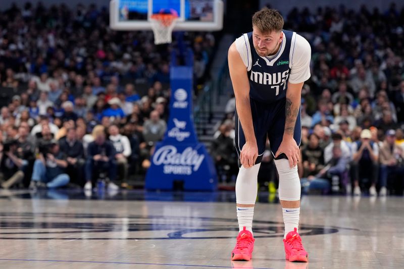 DALLAS, TEXAS - FEBRUARY 12: Luka Doncic #77 of the Dallas Mavericks looks on during the first half against the Washington Wizards at American Airlines Center on February 12, 2024 in Dallas, Texas. NOTE TO USER: User expressly acknowledges and agrees that, by downloading and or using this photograph, User is consenting to the terms and conditions of the Getty Images License Agreement. (Photo by Sam Hodde/Getty Images)