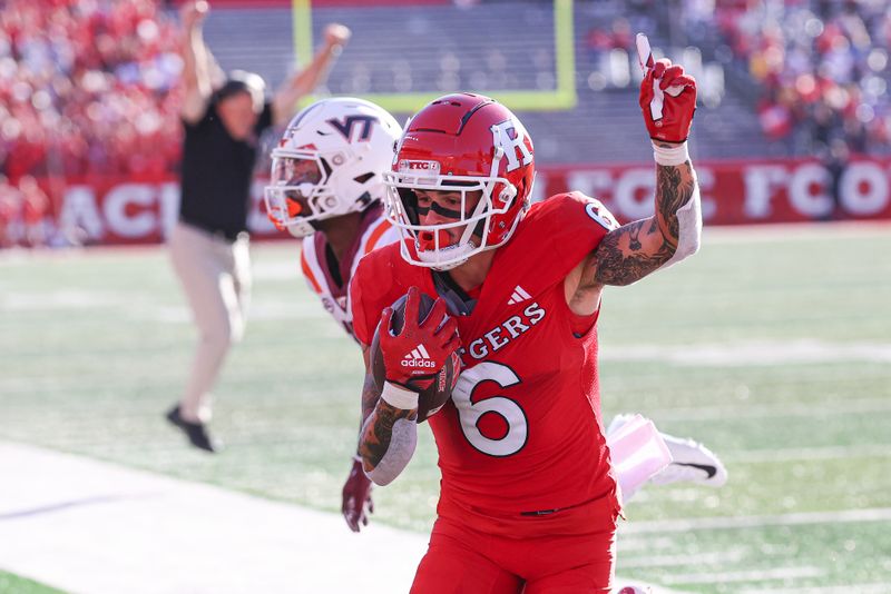 Sep 16, 2023; Piscataway, New Jersey, USA; Rutgers Scarlet Knights wide receiver Christian Dremel (6) celebrates his touchdown reception during the first half against the Virginia Tech Hokies at SHI Stadium. Mandatory Credit: Vincent Carchietta-USA TODAY Sports