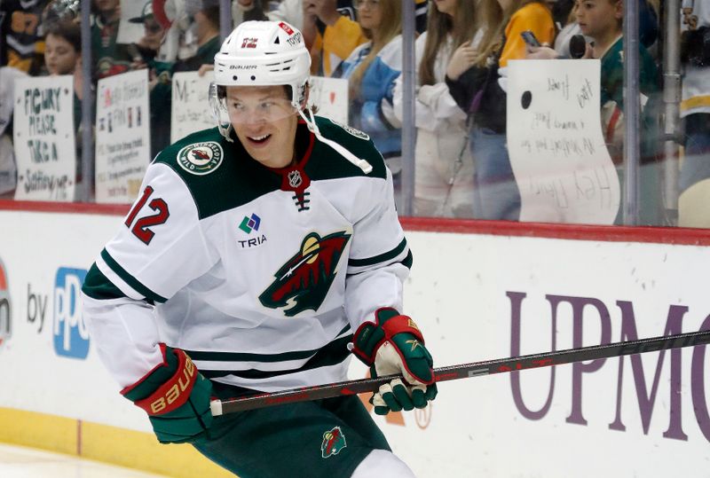 Apr 6, 2023; Pittsburgh, Pennsylvania, USA; Minnesota Wild left wing Matt Boldy (12) warms up before the game against the Pittsburgh Penguins at PPG Paints Arena. Mandatory Credit: Charles LeClaire-USA TODAY Sports