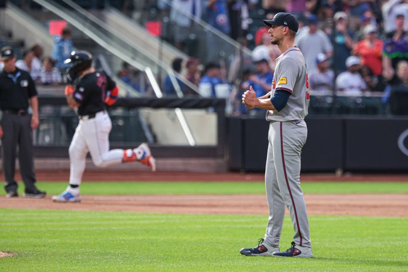 Jul 26, 2024; New York City, New York, USA; Atlanta Braves starting pitcher Charlie Morton (50) looks up after allowing a solo home run to New York Mets catcher Francisco Alvarez (4)  during the third inning at Citi Field. Mandatory Credit: Vincent Carchietta-USA TODAY Sports