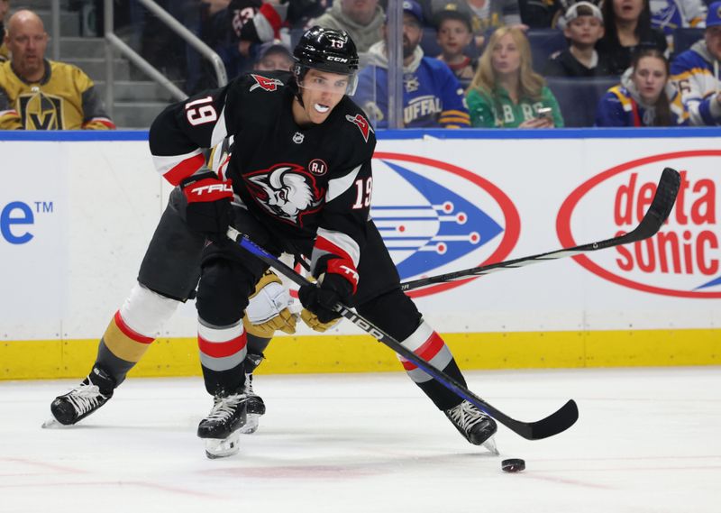 Mar 2, 2024; Buffalo, New York, USA;  Buffalo Sabres center Peyton Krebs (19) looks to make a pass during the second period against the Vegas Golden Knights at KeyBank Center. Mandatory Credit: Timothy T. Ludwig-USA TODAY Sports