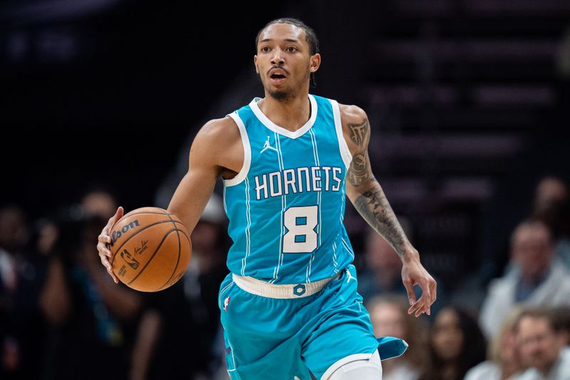 CHARLOTTE, NORTH CAROLINA - FEBRUARY 03: Nick Smith Jr. #8 of the Charlotte Hornets plays against the Washington Wizards during their game at Spectrum Center on February 03, 2025 in Charlotte, North Carolina. NOTE TO USER: User expressly acknowledges and agrees that, by downloading and or using this photograph, User is consenting to the terms and conditions of the Getty Images License Agreement. (Photo by Jacob Kupferman/Getty Images)