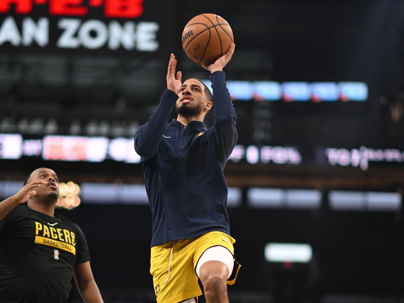 HOUSTON, TX - MARCH 3: Tyrese Haliburton #0 of the Indiana Pacers warms up before the game against the San Antonio Spurs on March 3, 2024 at the Toyota Center in Houston, Texas. NOTE TO USER: User expressly acknowledges and agrees that, by downloading and or using this photograph, User is consenting to the terms and conditions of the Getty Images License Agreement. Mandatory Copyright Notice: Copyright 2024 NBAE (Photo by Logan Riely/NBAE via Getty Images)