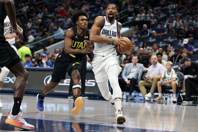 DALLAS, TEXAS - OCTOBER 10: Spencer Dinwiddie #26 of the Dallas Mavericks drives to the basket against Collin Sexton #2 of the Utah Jazz in the first half at American Airlines Center on October 10, 2024 in Dallas, Texas. NOTE TO USER: User expressly acknowledges and agrees that, by downloading and or using this Photograph, user is consenting to the terms and conditions of the Getty Images License Agreement. Mandatory Copyright Notice: Copyright 2024 NBAE  (Photo by Tim Heitman/Getty Images)