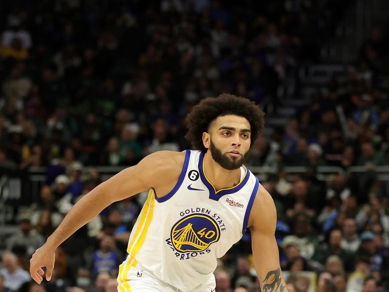 MILWAUKEE, WISCONSIN - DECEMBER 13: Anthony Lamb #40 of the Golden State Warriors handles the ball during a game against the Milwaukee Bucks at Fiserv Forum on December 13, 2022 in Milwaukee, Wisconsin. The Bucks defeated the Warriors 128-111. NOTE TO USER: User expressly acknowledges and agrees that, by downloading and or using this photograph, User is consenting to the terms and conditions of the Getty Images License Agreement. (Photo by Stacy Revere/Getty Images)