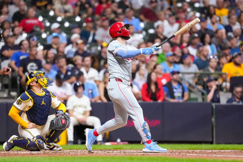 Sep 17, 2024; Milwaukee, Wisconsin, USA;  Philadelphia Phillies first baseman Bryce Harper (3) hits a home run during the sixth inning against the Milwaukee Brewers at American Family Field. Mandatory Credit: Jeff Hanisch-Imagn Images