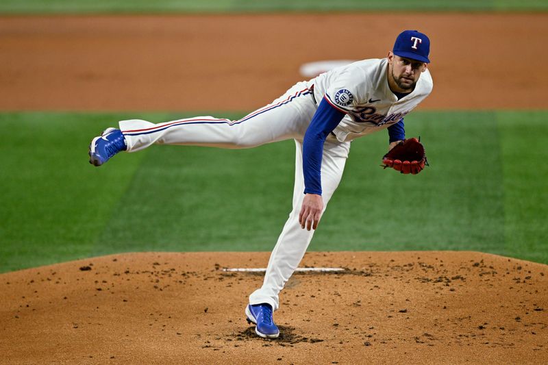 Sep 17, 2024; Arlington, Texas, USA; Texas Rangers starting pitcher Nathan Eovaldi (17) pitches against the Toronto Blue Jays during the first inning at Globe Life Field. Mandatory Credit: Jerome Miron-Imagn Images