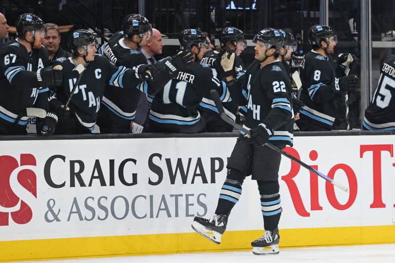 Nov 18, 2024; Salt Lake City, Utah, USA; Utah Hockey Club center Jack McBain (22) celebrates a goal against the Washington Capitals with teammates during the first period at Delta Center. Mandatory Credit: Rob Gray-Imagn Images