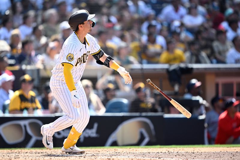 Jun 26, 2024; San Diego, California, USA; San Diego Padres catcher Kyle Higashioka (20) hits a grand slam home run against the Washington Nationals during the eighth inning at Petco Park. Mandatory Credit: Orlando Ramirez-USA TODAY Sports