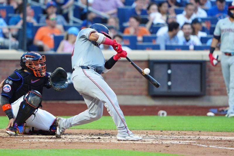 Jul 10, 2024; New York City, New York, USA; Washington Nationals catcher Keibert Ruiz (20) hits a single against the New York Mets during the fourth inning at Citi Field. Mandatory Credit: Gregory Fisher-USA TODAY Sports