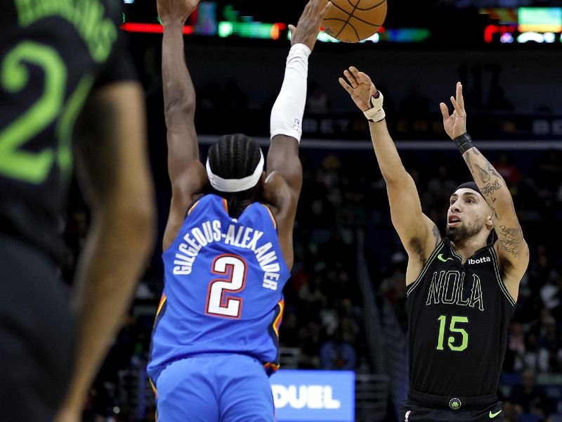 NEW ORLEANS, LOUISIANA - JANUARY 26: Jose Alvarado #15 of the New Orleans Pelicans shoots a three point basket over Shai Gilgeous-Alexander #2 of the Oklahoma City Thunder during the first quarter of an NBA game at Smoothie King Center on January 26, 2024 in New Orleans, Louisiana. NOTE TO USER: User expressly acknowledges and agrees that, by downloading and or using this photograph, User is consenting to the terms and conditions of the Getty Images License Agreement. (Photo by Sean Gardner/Getty Images)