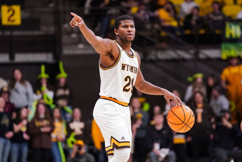 Jan 31, 2023; Laramie, Wyoming, USA; Wyoming Cowboys guard Ethan Anderson (20) calls a play during the second half against the Fresno State Bulldogs at Arena-Auditorium. Mandatory Credit: Troy Babbitt-USA TODAY Sports