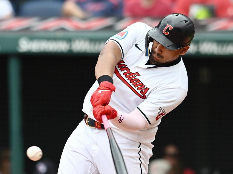 Jul 25, 2024; Cleveland, Ohio, USA; Cleveland Guardians first baseman Josh Naylor (22) hits a double during the seventh inning against the Detroit Tigers at Progressive Field. Mandatory Credit: Ken Blaze-USA TODAY Sports