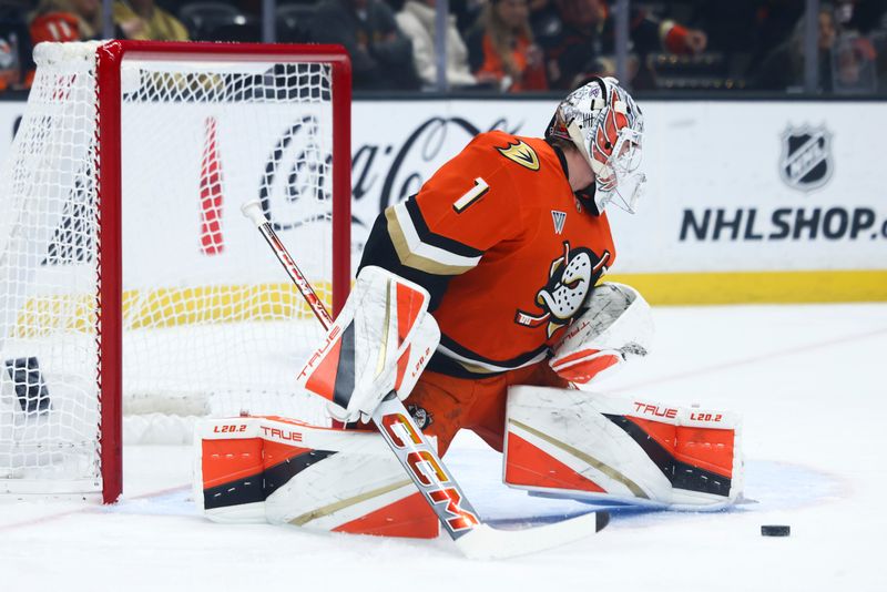 Nov 13, 2024; Anaheim, California, USA; Anaheim Ducks goaltender Lukas Dostal (1) makes a save against the Vegas Golden Knights during the first period of a hockey game at Honda Center. Mandatory Credit: Jessica Alcheh-Imagn Images