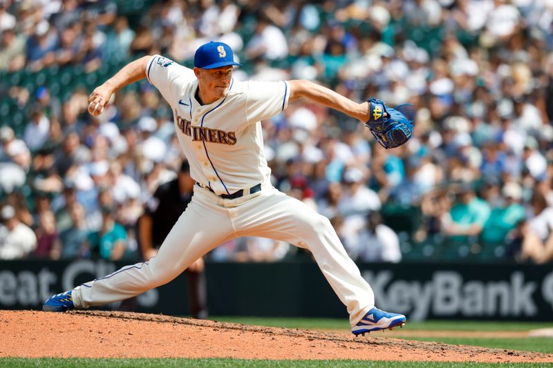 Jul 16, 2023; Seattle, Washington, USA; Seattle Mariners relief pitcher Paul Sewald (37) throws against the Detroit Tigers during the ninth inning at T-Mobile Park. Mandatory Credit: Joe Nicholson-USA TODAY Sports