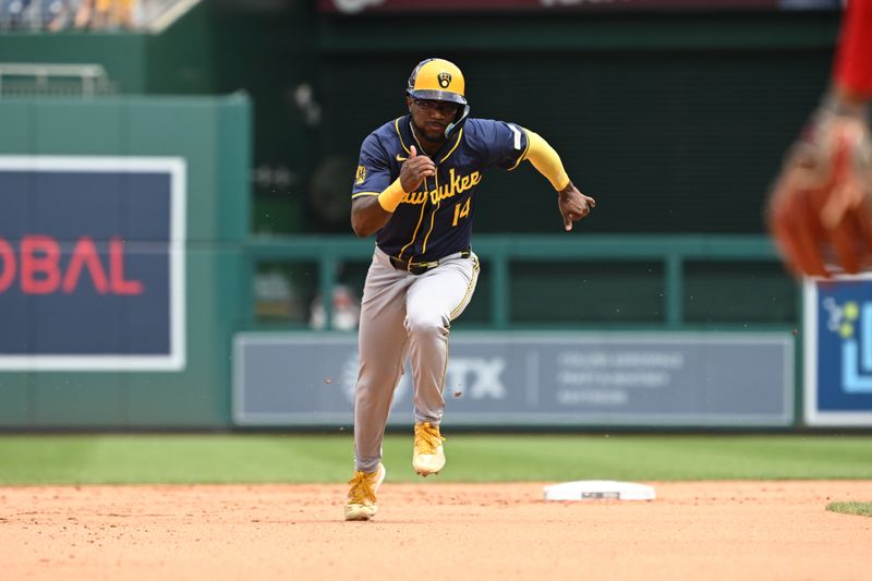 Aug 4, 2024; Washington, District of Columbia, USA; Milwaukee Brewers third baseman Andruw Monasterio (14) sprints to third base against the Washington Nationals during the fifth inning at Nationals Park. Mandatory Credit: Rafael Suanes-USA TODAY Sports
