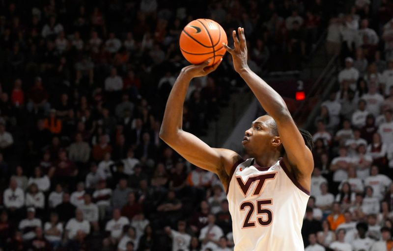 Feb 21, 2023; Blacksburg, Virginia, USA; Virginia Tech Hokies forward Justyn Mutts (25) shoots against the Miami Hurricanes in the second half at Cassell Coliseum. Mandatory Credit: Lee Luther Jr.-USA TODAY Sports