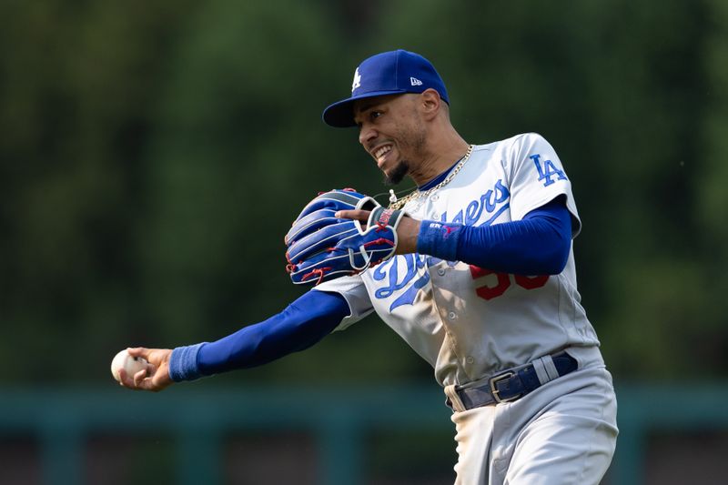 Jun 10, 2023; Philadelphia, Pennsylvania, USA; Los Angeles Dodgers right fielder Mookie Betts (50) fields a ground ball for an out against Philadelphia Phillies center fielder Brandon Marsh (not pictured) during the fourth inning at Citizens Bank Park. Mandatory Credit: Bill Streicher-USA TODAY Sports