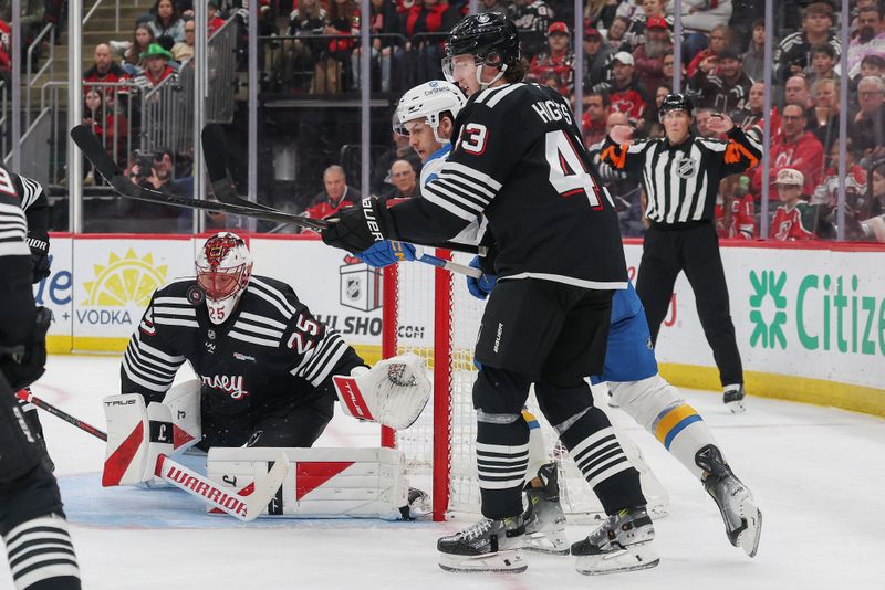 Nov 26, 2025; Newark, New Jersey, USA; New Jersey Devils goaltender Jacob Markstrom (25) makes a save against the St. Louis Blues during the first period at Prudential Center. Mandatory Credit: Ed Mulholland-Imagn Images