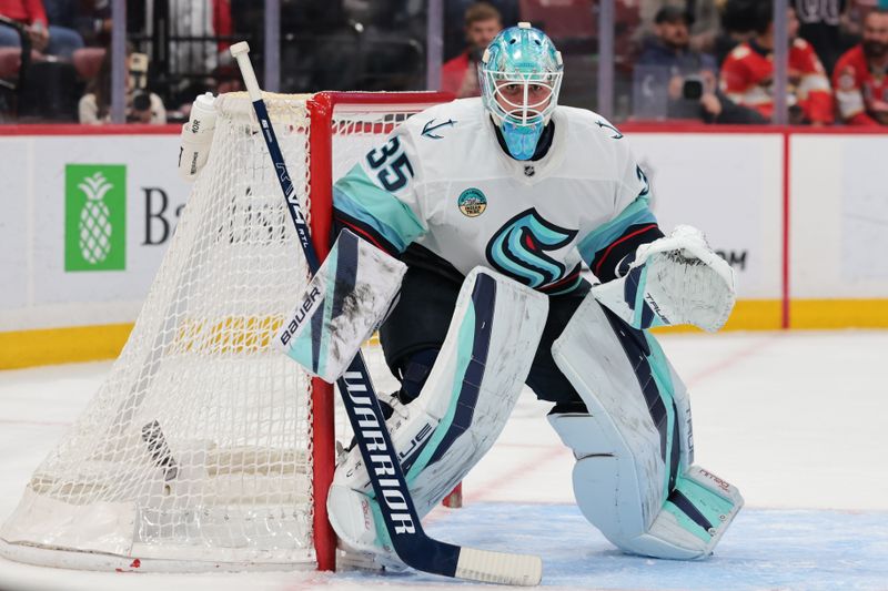 Mar 24, 2026; Sunrise, Florida, USA; Seattle Kraken goaltender Joey Daccord (35) defends his net against the Florida Panthers during the first period at Amerant Bank Arena. Mandatory Credit: Sam Navarro-Imagn Images