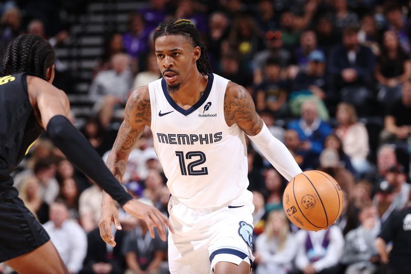 SALT LAKE CITY, UT - OCTOBER 23: Ja Morant #12 of the Memphis Grizzlies looks to pass the ball during the game against the Utah Jazz on OCTOBER 23, 2024 at vivint.SmartHome Arena in Salt Lake City, Utah. NOTE TO USER: User expressly acknowledges and agrees that, by downloading and or using this Photograph, User is consenting to the terms and conditions of the Getty Images License Agreement. Mandatory Copyright Notice: Copyright 2024 NBAE (Photo by Melissa Majchrzak/NBAE via Getty Images)