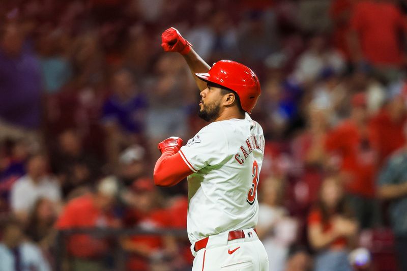 Jul 29, 2024; Cincinnati, Ohio, USA; Cincinnati Reds designated hitter Jeimer Candelario (3) reacts after hitting a solo home run in the eighth inning against the Chicago Cubs at Great American Ball Park. Mandatory Credit: Katie Stratman-USA TODAY Sports