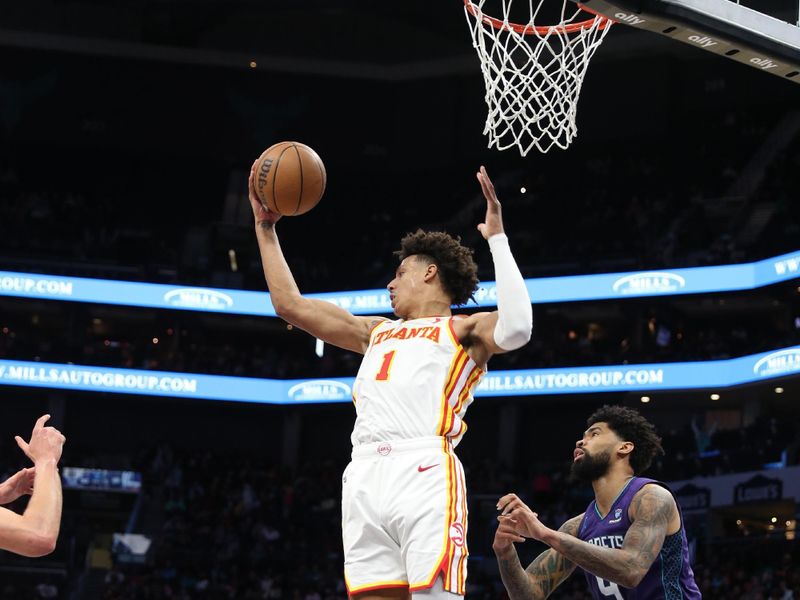 CHARLOTTE, NC - FEBRUARY 14: Jalen Johnson #1 of the Atlanta Hawks handles the ball during the game against the Charlotte Hornets on February 14, 2024 at Spectrum Center in Charlotte, North Carolina. NOTE TO USER: User expressly acknowledges and agrees that, by downloading and or using this photograph, User is consenting to the terms and conditions of the Getty Images License Agreement.  Mandatory Copyright Notice:  Copyright 2024 NBAE (Photo by Brock Williams-Smith/NBAE via Getty Images)