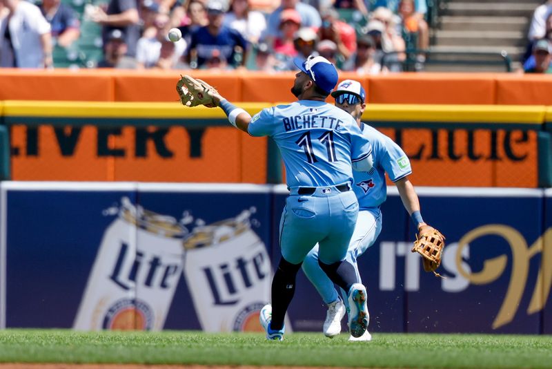 Jul 27, 2025; Detroit, Michigan, USA;  Toronto Blue Jays shortstop Bo Bichette (11) makes a catch in the third inning against the Detroit Tigers at Comerica Park. Mandatory Credit: Rick Osentoski-Imagn Images