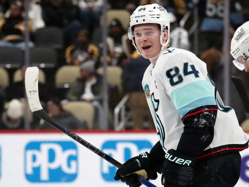 Jan 14, 2025; Pittsburgh, Pennsylvania, USA;  Seattle Kraken right wing Kaapo Kakko (84) reacts after scoring an empty net goal the against the Pittsburgh Penguins during the third period at PPG Paints Arena. Mandatory Credit: Charles LeClaire-Imagn Images