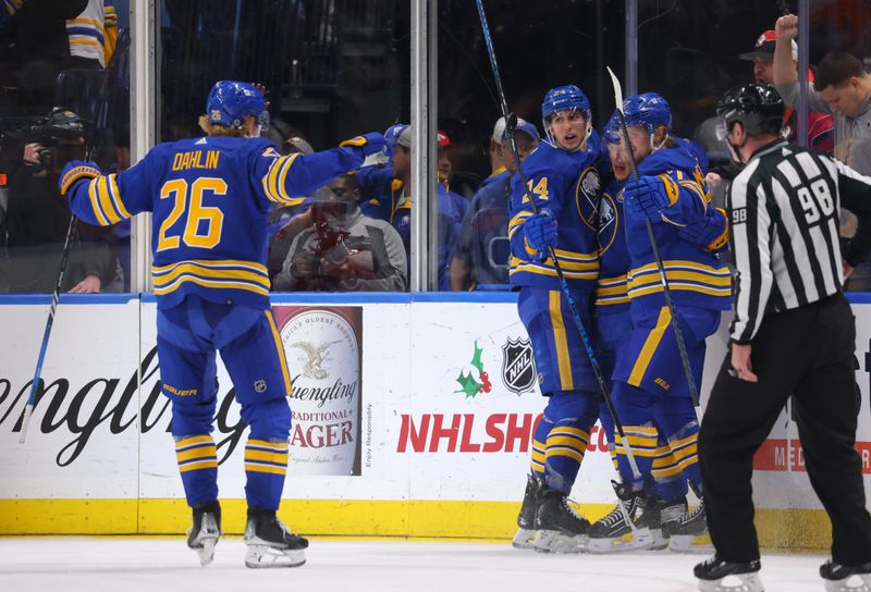 Dec 5, 2023; Buffalo, New York, USA;  Buffalo Sabres left wing Jeff Skinner (53) celebrates his goal with teammates during the third period against the Detroit Red Wings at KeyBank Center. Mandatory Credit: Timothy T. Ludwig-USA TODAY Sports