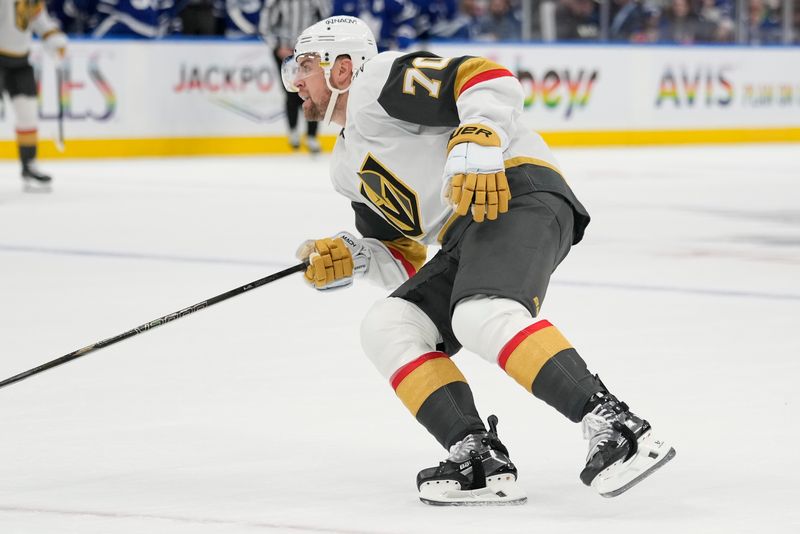 Nov 20, 2024; Toronto, Ontario, CAN; Vegas Golden Knights forward Tanner Pearson (70) skates against the Toronto Maple Leafs during the second period at Scotiabank Arena. Mandatory Credit: John E. Sokolowski-Imagn Images