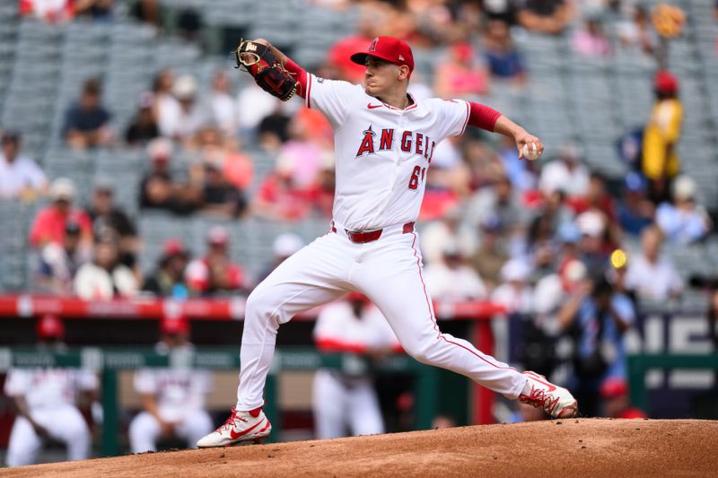 Sep 28, 2025; Anaheim, California, USA; Los Angeles Angels starting pitcher Sam Aldegheri (61) delivers during the first inning against the Houston Astros at Angel Stadium. Mandatory Credit: William Liang-Imagn Images