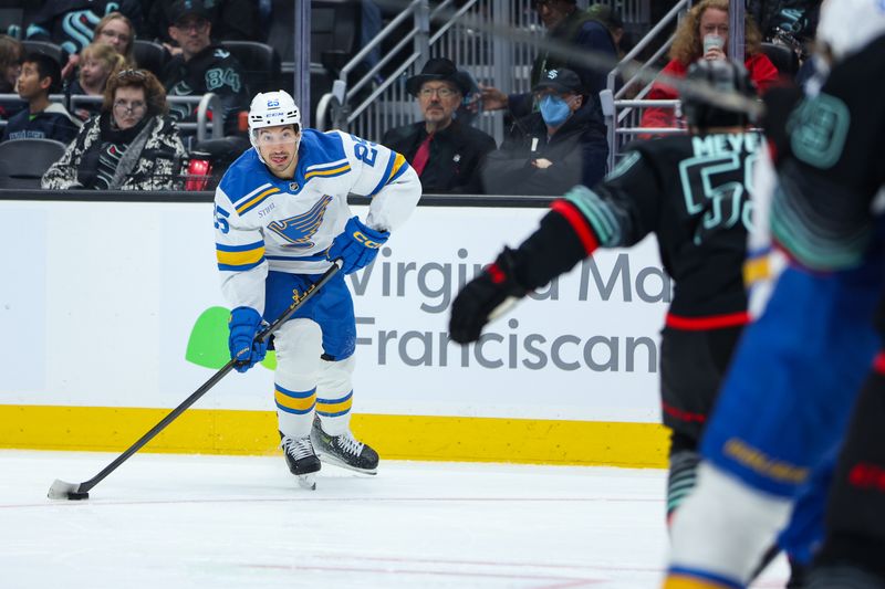 Mar 4, 2026; Seattle, Washington, USA; St. Louis Blues right wing Jordan Kyrou (25) looks to shoot in the first period against the Seattle Kraken at Climate Pledge Arena. Mandatory Credit: Kevin Ng-Imagn Images