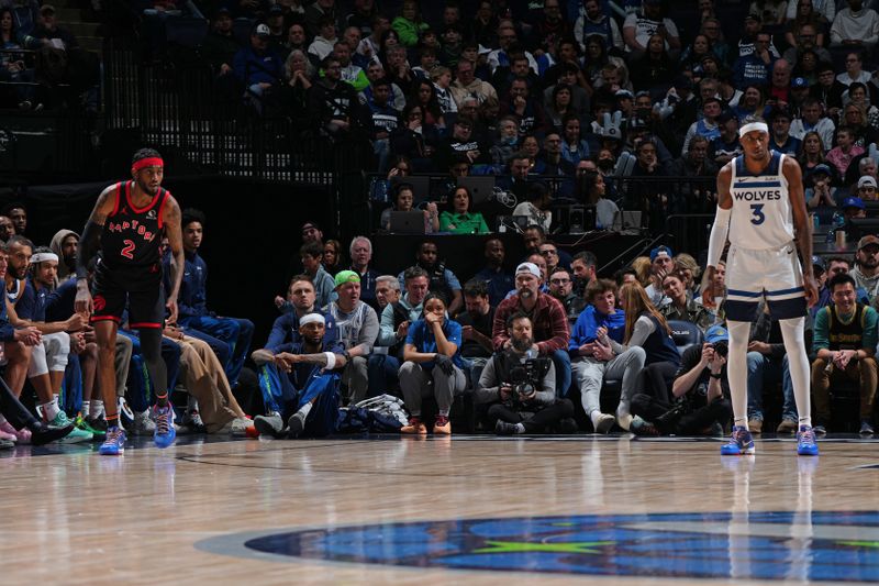 MINNEAPOLIS, MN -  APRIL 3:  Jalen McDaniels #2 of the Toronto Raptors and Jaden McDaniels #3 of the Minnesota Timberwolves look on during the game on April 3, 2024 at Target Center in Minneapolis, Minnesota. NOTE TO USER: User expressly acknowledges and agrees that, by downloading and or using this Photograph, user is consenting to the terms and conditions of the Getty Images License Agreement. Mandatory Copyright Notice: Copyright 2024 NBAE (Photo by Jordan Johnson/NBAE via Getty Images)