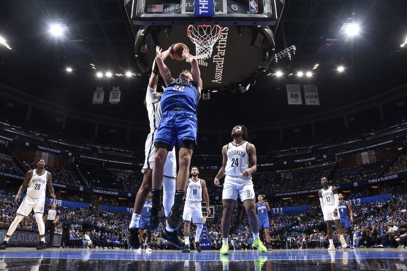 ORLANDO, FL - OCTOBER 25: Franz Wagner #22 of the Orlando Magic drives to the basket during the game against the Brooklyn Nets on October 25, 2024 at Kia Center in Orlando, Florida. NOTE TO USER: User expressly acknowledges and agrees that, by downloading and or using this photograph, User is consenting to the terms and conditions of the Getty Images License Agreement. Mandatory Copyright Notice: Copyright 2024 NBAE (Photo by Fernando Medina/NBAE via Getty Images)