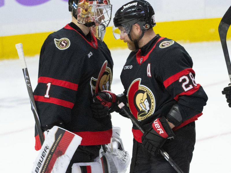 Nov 13, 2025; Ottawa, Ontario, CAN; Ottawa Senators goalie Leevi Merilainen (1) is congratulated by right wing Claude Giroux (28) following a win against the Boston Bruins at the Canadian Tire Centre. Mandatory Credit: Marc DesRosiers-IMAGN Images
