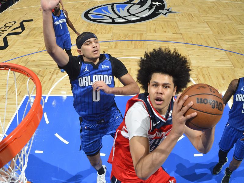 ORLANDO, FL - FEBRUARY 23:  Kyshawn George #18 of the Washington Wizards drives to the basket during the game against the Orlando Magic on February 23, 2025 at Kia Center in Orlando, Florida. NOTE TO USER: User expressly acknowledges and agrees that, by downloading and or using this photograph, User is consenting to the terms and conditions of the Getty Images License Agreement. Mandatory Copyright Notice: Copyright 2025 NBAE (Photo by Fernando Medina/NBAE via Getty Images)