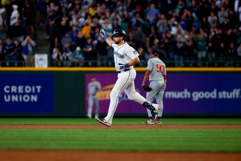 May 31, 2025; Seattle, Washington, USA; Seattle Mariners designated hitter Cal Raleigh (29) runs the bases after hitting a two-run home run against the Minnesota Twins during the third inning at T-Mobile Park. Mandatory Credit: Joe Nicholson-Imagn Images