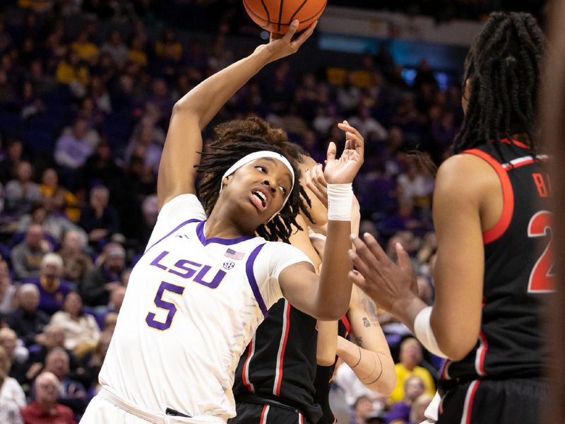 Feb 2, 2023; Baton Rouge, Louisiana, USA;  LSU Lady Tigers forward Sa'Myah Smith (5) grabs a rebound against the Georgia Lady Bulldogs during the first half at Pete Maravich Assembly Center. Mandatory Credit: Stephen Lew-USA TODAY Sports