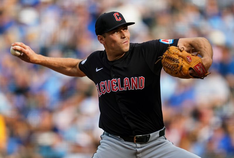 Sep 2, 2024; Kansas City, Missouri, USA; Cleveland Guardians relief pitcher Cade Smith (36) pitches during the eighth inning against the Kansas City Royals at Kauffman Stadium. Mandatory Credit: Jay Biggerstaff-USA TODAY Sports