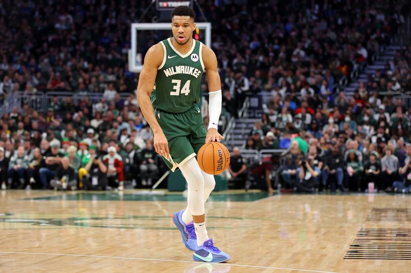 MILWAUKEE, WISCONSIN - DECEMBER 21: Giannis Antetokounmpo #34 of the Milwaukee Bucks handles the ball during a game against the Orlando Magic at Fiserv Forum on December 21, 2023 in Milwaukee, Wisconsin. NOTE TO USER: User expressly acknowledges and agrees that, by downloading and or using this photograph, User is consenting to the terms and conditions of the Getty Images License Agreement. (Photo by Stacy Revere/Getty Images)