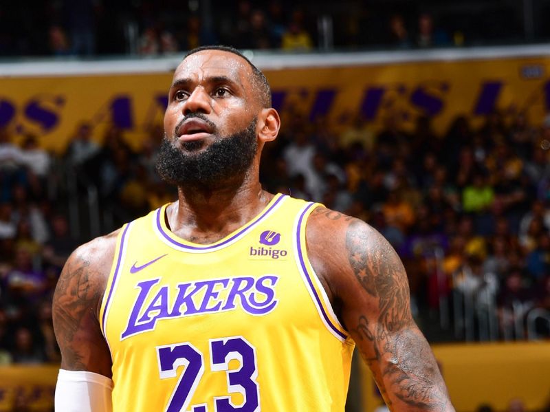 LOS ANGELES, CA - MARCH 18:  LeBron James #23 of the Los Angeles Lakers shoots a free throw during the game on March 18, 2024 at Crypto.Com Arena in Los Angeles, California. NOTE TO USER: User expressly acknowledges and agrees that, by downloading and/or using this Photograph, user is consenting to the terms and conditions of the Getty Images License Agreement. Mandatory Copyright Notice: Copyright 2024 NBAE (Photo by Adam Pantozzi/NBAE via Getty Images)