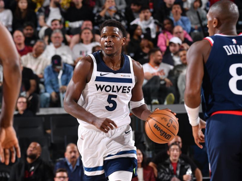 INGLEWOOD, CA - DECEMBER 4:  Anthony Edwards #5 of the Minnesota Timberwolves dribbles the ball during the game against the LA Clippers during a regular season game on December 4, 2024 at Intuit Dome in Los Angeles, California. NOTE TO USER: User expressly acknowledges and agrees that, by downloading and/or using this Photograph, user is consenting to the terms and conditions of the Getty Images License Agreement. Mandatory Copyright Notice: Copyright 2024 NBAE (Photo by Juan Ocampo/NBAE via Getty Images)