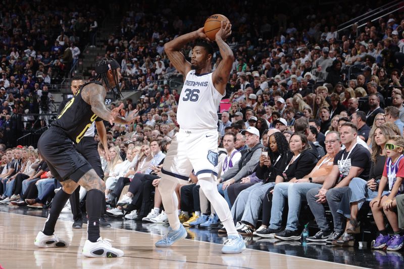 SALT LAKE CITY, UT - OCTOBER 23: Marcus Smart #36 of the Memphis Grizzlies looks to pass the ball during the game against the Utah Jazz on OCTOBER 23, 2024 at vivint.SmartHome Arena in Salt Lake City, Utah. NOTE TO USER: User expressly acknowledges and agrees that, by downloading and or using this Photograph, User is consenting to the terms and conditions of the Getty Images License Agreement. Mandatory Copyright Notice: Copyright 2024 NBAE (Photo by Melissa Majchrzak/NBAE via Getty Images)