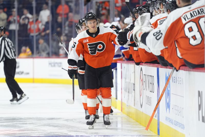 Oct 25, 2025; Philadelphia, Pennsylvania, USA; Philadelphia Flyers center Trevor Zegras (46) celebrates with teammates after scoring a goal against the New York Islanders in the third period at Xfinity Mobile Arena. Mandatory Credit: Kyle Ross-Imagn Images