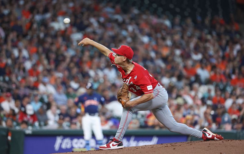 Jun 18, 2023; Houston, Texas, USA; Cincinnati Reds starting pitcher Luke Weaver (34) delivers a pitch during the first inning against the Houston Astros at Minute Maid Park. Mandatory Credit: Troy Taormina-USA TODAY Sports