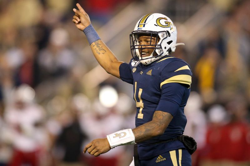 Nov 21, 2019; Atlanta, GA, USA; Georgia Tech Yellow Jackets quarterback James Graham (4) reacts in the first half against the North Carolina State Wolfpack at Bobby Dodd Stadium. Mandatory Credit: Brett Davis-USA TODAY Sports