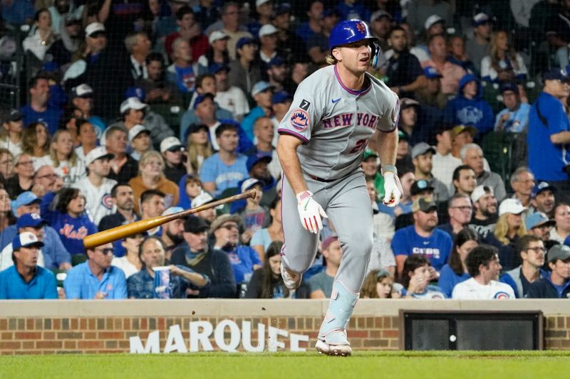 Sep 23, 2025; Chicago, Illinois, USA; New York Mets first baseman Pete Alonso (20) hits a RBI single against the Chicago Cubs during the sixth inning at Wrigley Field. Mandatory Credit: David Banks-Imagn Images