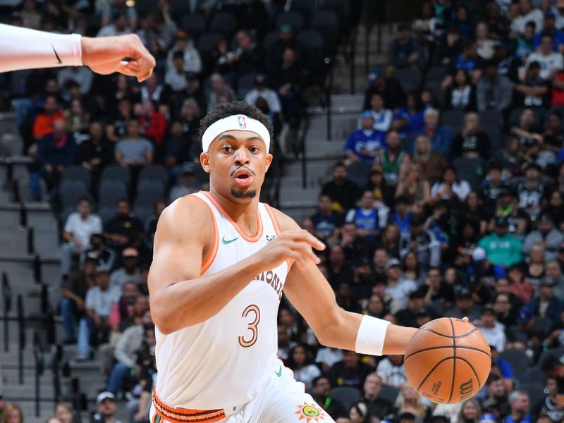 SAN ANTONIO, TX - MARCH 19: Keldon Johnson #3 of the San Antonio Spurs handles the ball during the game against the Dallas Mavericks on March 19, 2024 at the Frost Bank Center in San Antonio, Texas. NOTE TO USER: User expressly acknowledges and agrees that, by downloading and or using this photograph, user is consenting to the terms and conditions of the Getty Images License Agreement. Mandatory Copyright Notice: Copyright 2024 NBAE (Photos by Michael Gonzales/NBAE via Getty Images)